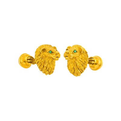 Lot 100 - Tiffany & Co. Pair of Gold and Emerald Lion Head Cufflinks