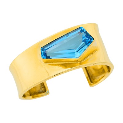Lot 113 - Gold and Blue Topaz Cuff Bangle Bracelet