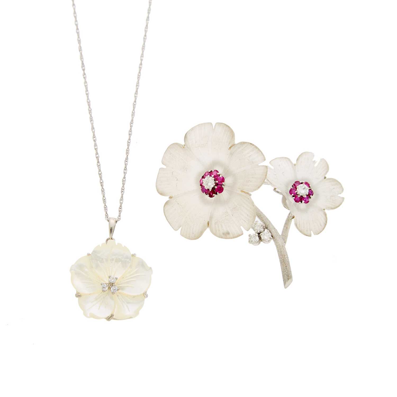 Lot 1084 - White Gold, Carved Frosted Rock Crystal, Diamond and Ruby Flower Brooch and Silver, Carved Mother-of-Pearl and Simulated Diamond Flower Pendant with Silver Chain