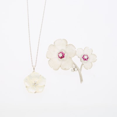 Lot 1084 - White Gold, Carved Frosted Rock Crystal, Diamond and Ruby Flower Brooch and Silver, Carved Mother-of-Pearl and Simulated Diamond Flower Pendant with Silver Chain