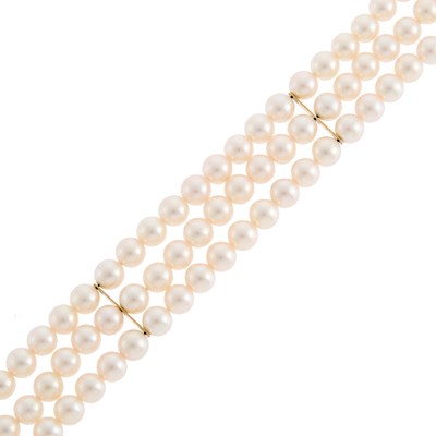 Lot 1072 - Mikimoto Triple Strand Cultured Pearl Bracelet with Gold Clasp