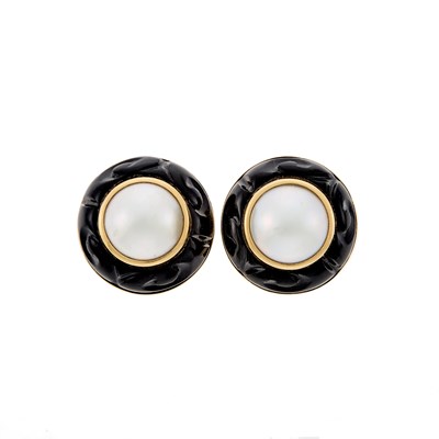 Lot 1013 - Seaman Schepps Pair of Gold, Mabé Pearl and Carved Black Onyx Earclips