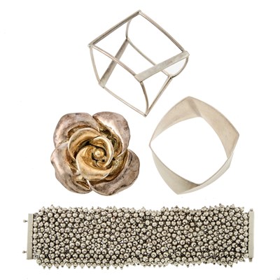 Lot 1221 - Tiffany & Co., Frank Gehry Two Sterling Silver Cuff Bracelets, Silver Bead Bracelet and Silver-Gilt Flower Brooch