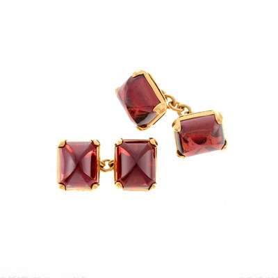 Lot 1021 - Seaman Schepps Pair of Gold and Garnet Cufflinks