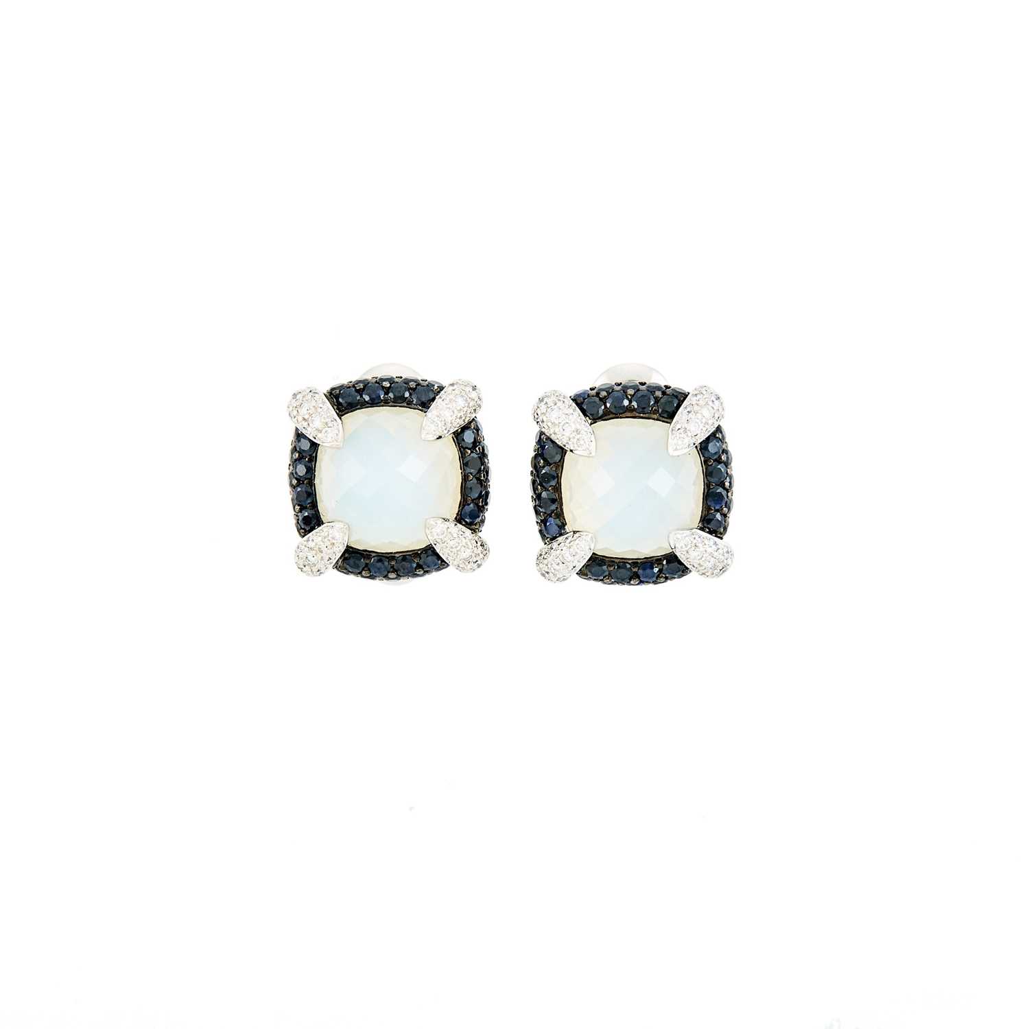 Lot 1086 - Pair of White Gold, Frosted Rock Crystal, Diamond and Black Diamond Earclips