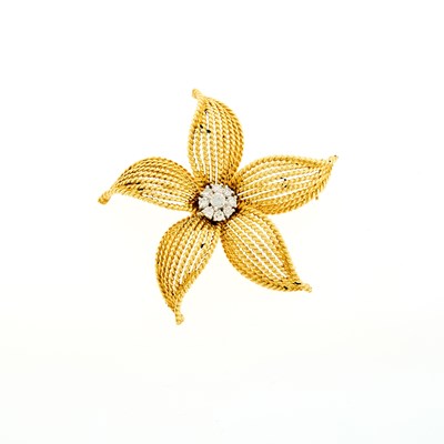Lot 1136 - Tiffany & Co. Gold and Diamond Flower Brooch