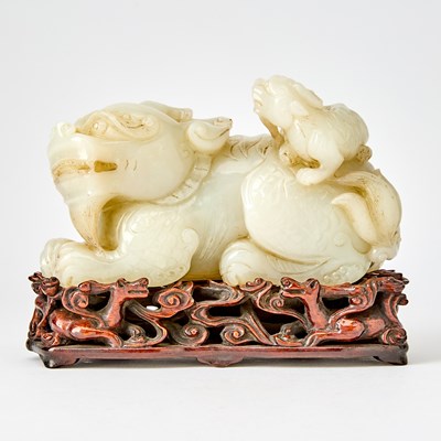 Lot 353 - A Chinese White Jade Carving of a Qilin