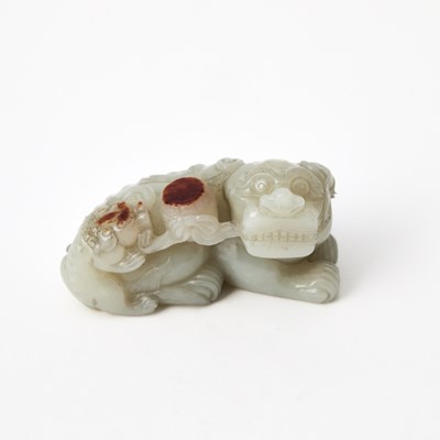 Lot 352 - A Chinese White Jade Carving of Qilin and Cub