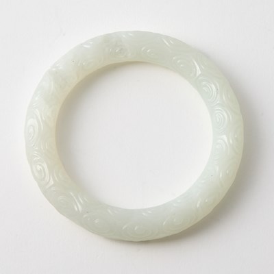 Lot 429 - A Chinese White Jade Bangle