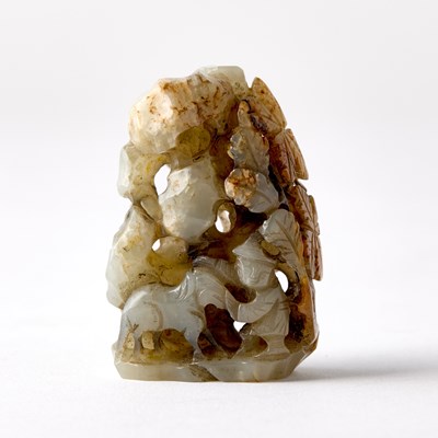 Lot 322 - A Chinese Mottled Jade Finial