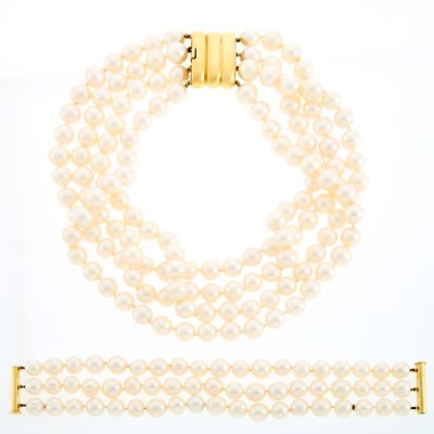 Lot 1229 - Four Strand Freshwater Pearl Necklace and Triple Strand Bracelet with Gold Clasps