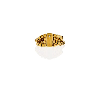 Lot 1052 - H. Stern Four Strand Gold and Diamond Ring