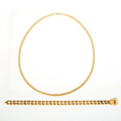 Lot 1246 - Gold and Diamond Rope-Twist Slide Bracelet and Low Karat Gold Flat Chain Necklace