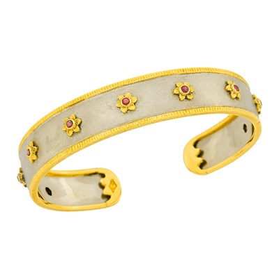 Lot 73 - Mario Buccellati Two-Color Gold and Ruby Bangle Bracelet