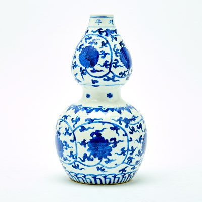 Lot 185 - A Chinese Blue and White Porcelain Double Gourd Vase
