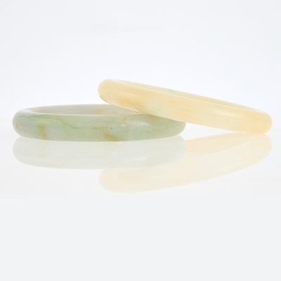 Lot 1250 - Two Jade Bangle Bracelets