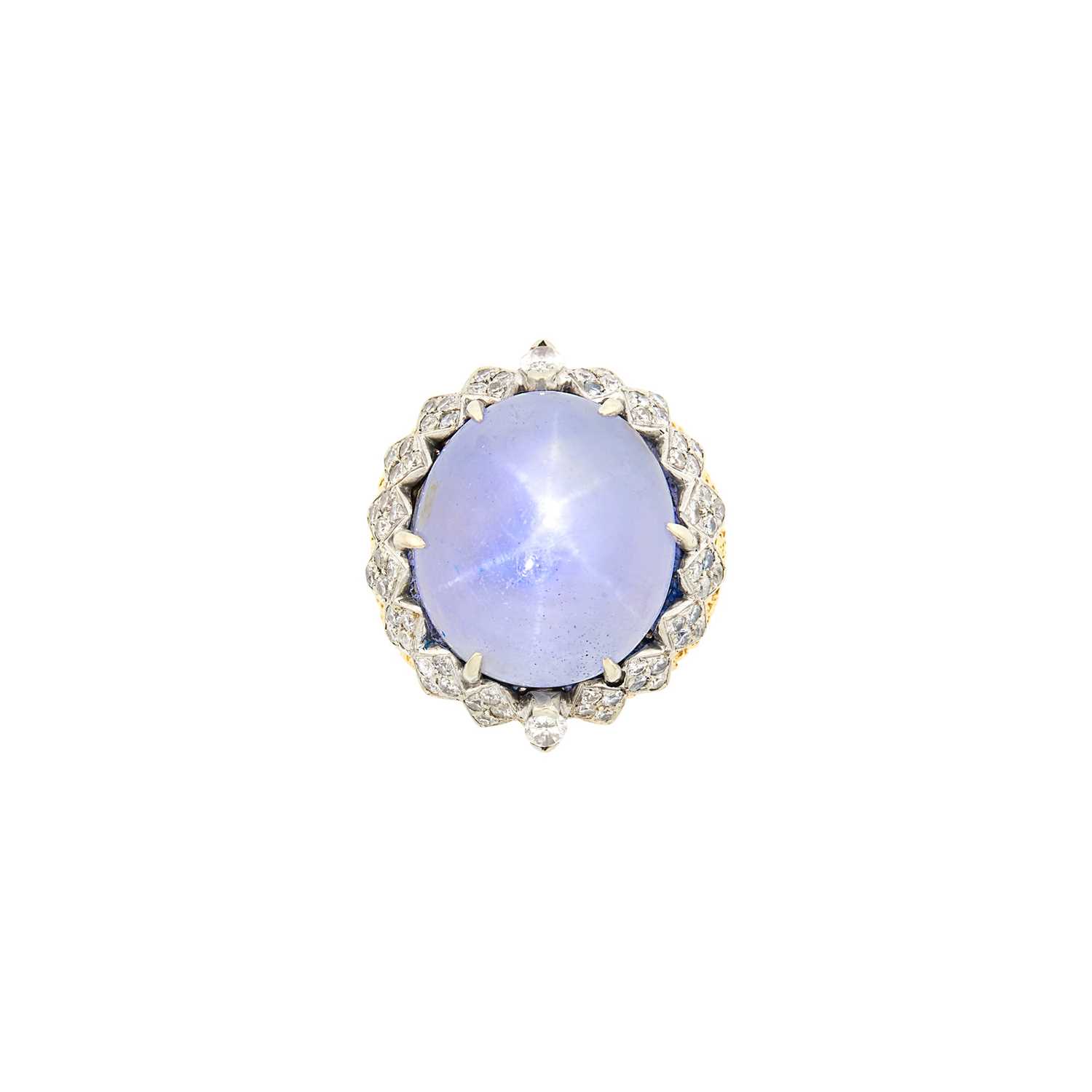 Lot 30 - Two-Color Gold, Star Sapphire and Diamond Ring