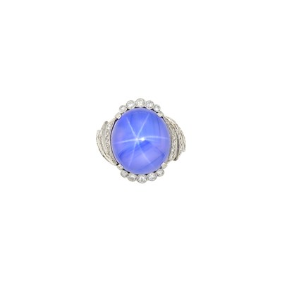 Lot 216 - Gold, Platinum, Star Sapphire and Diamond Ring