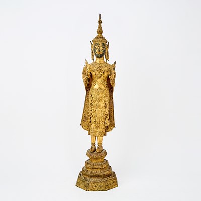 Lot 618 - A Thai Gilt Lacquered Bronze Figure of Standing Buddha