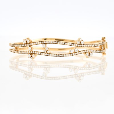 Lot 1027 - Hueb Gold and Diamond Bangle Bracelet
