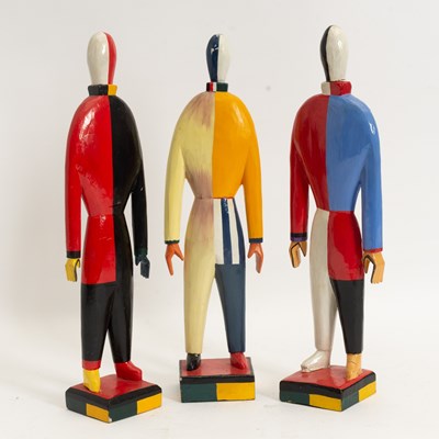 Lot 394 - Set of Three Kazimir Malevich Painted Wood and Composition "Sportsman" Figures