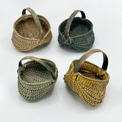 Lot 1189 - Group of Four Painted Splint Buttocks Baskets