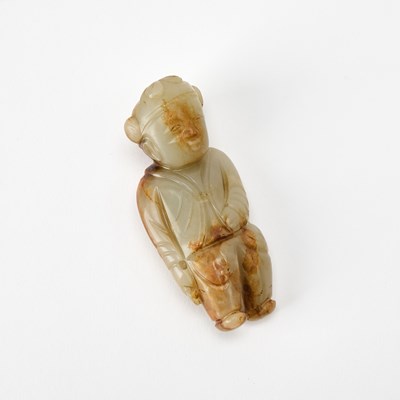 Lot 347 - A Chinese Carved Celadon and Russet Jade Figure of a Boy