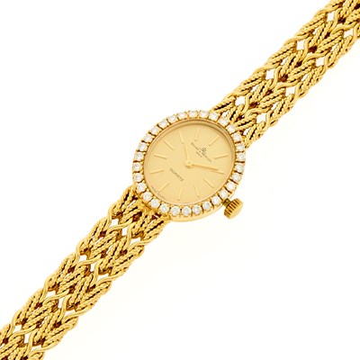 Lot 2097 - Baume & Mercier Lady's Gold and Diamond Wristwatch