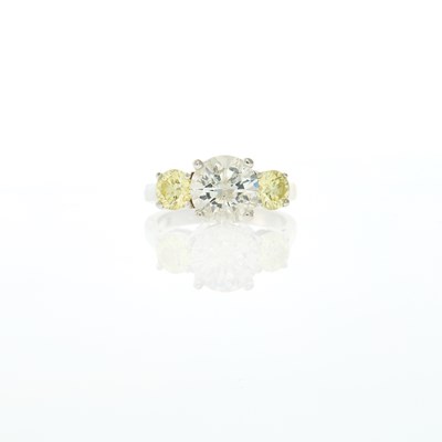 Lot 2064 - White Gold, Laser-Drilled Diamond and Colored Diamond Ring