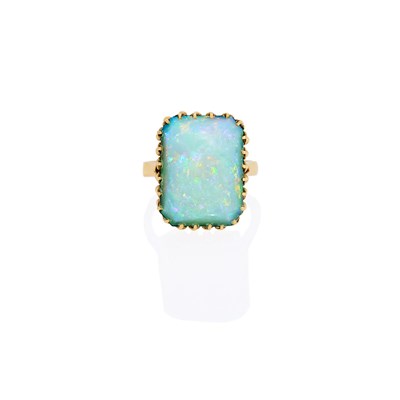 Lot 1157 - Gold and White Opal Ring