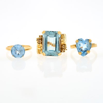 Lot 2234 - Three Gold and Blue Topaz Rings