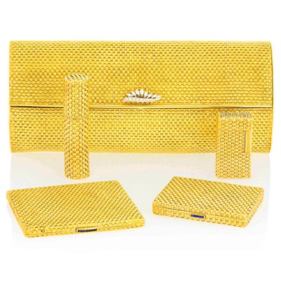 Lot 148 - Two-Color Woven Gold Mesh and Diamond Clutch, Gold and Sapphire Cigarette Case, Gold Lighter and Fred Gold and Sapphire Compact and Perfume Holder, France