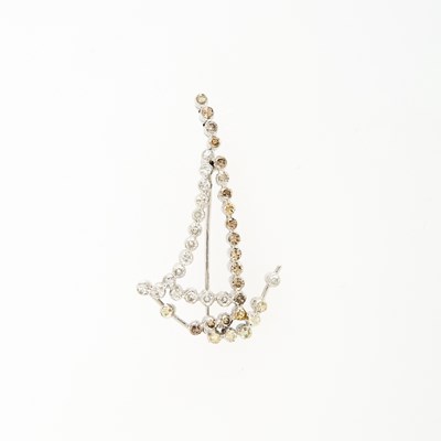 Lot 1219 - White Gold, Colored Diamond and Diamond Sailboat Brooch