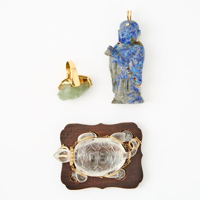 Lot 431 - Three Chinese Gold-Set Hardstone Carvings