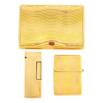 Lot 1093 - Two-Color Gold and Cabochon Ruby Cigarette Holder and Lighter and Dunhill Gold Lighter