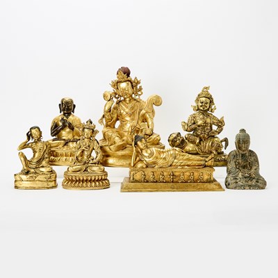 Lot 210 - Group of Six Sino-Tibetan Style Gilt Bronze and a Stone Figural Sculpture