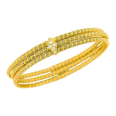 Lot 86 - Two-Color Gold and Diamond Bangle Bracelet