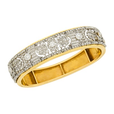 Lot 1053 - Gold, Platinum and Diamond Bangle Bracelet