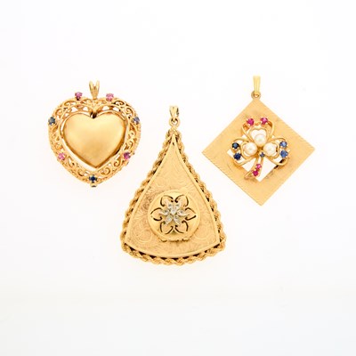 Lot 2096 - Two Gold and Gem-Set Charms and Watch-Pendant