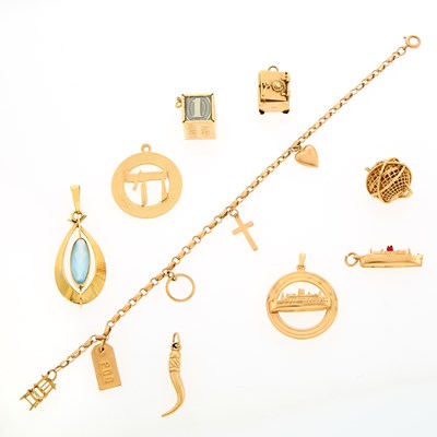 Lot 2232 - Gold Charm Bracelet and Loose Charms