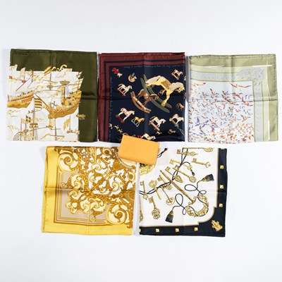 Lot 1249 - Hermès Tan Leather Clutch and Group of Silk Scarves