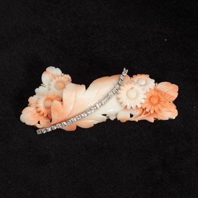 Lot 213 - Two-Color Gold, Carved Angel Skin Coral and Diamond Brooch