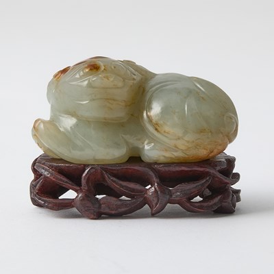 Lot 351 - A Chinese Carved Jade Qilin and Stand