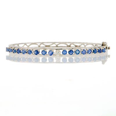 Lot 2191 - White Gold, Sapphire and Diamond Bangle Bracelet