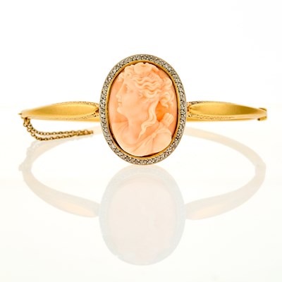 Lot 2117 - Gold, Platinum, Carved Coral and Diamond Bangle Bracelet