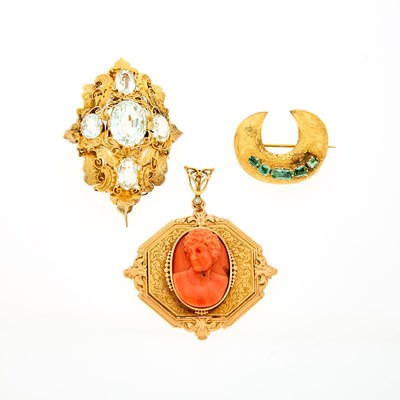 Lot 2112 - Three Antique Gold, Aquamarine, Emerald and Carved Coral Pendants and Brooches
