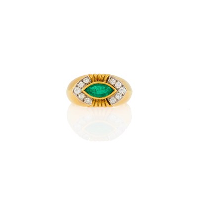 Lot 1184 - Two-Color Gold, Emerald and Diamond Ring