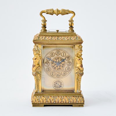 Lot 528 - Tiffany & Co. Gilt Metal Caryatid Cased Carriage Clock