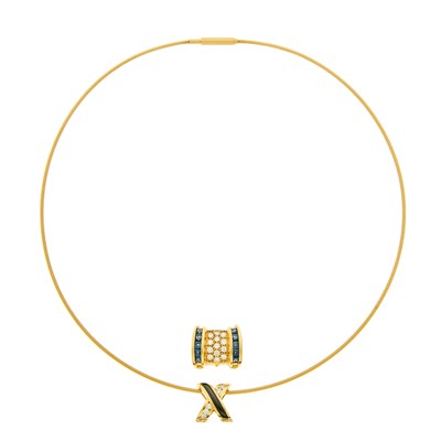 Lot 1164 - Gold Wire Necklace with Two Gold, Black Onyx, Sapphire and Diamond Enhancers