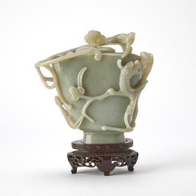 Lot 426 - A Chinese Carved Celadon Jade Libation Cup